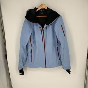 Norrøna Light Blue Waterproof Hooded Ski Jacket with Red Zippers